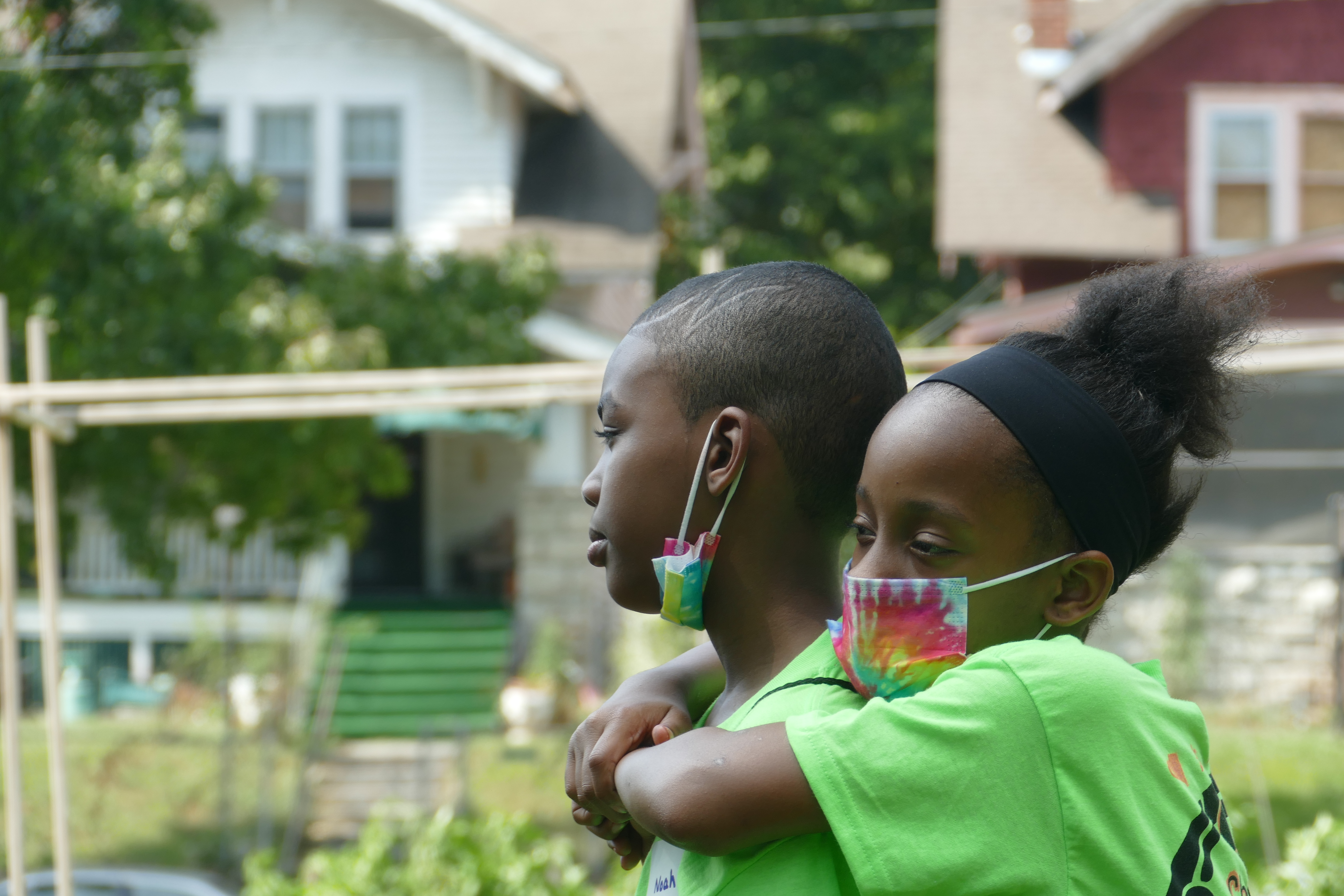 Young children hugging